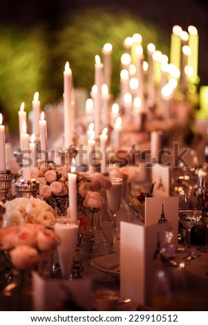 Table set for wedding reception with candles