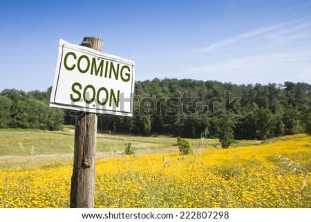 Coming Soon concept - Coming Soon concept written on a field sign