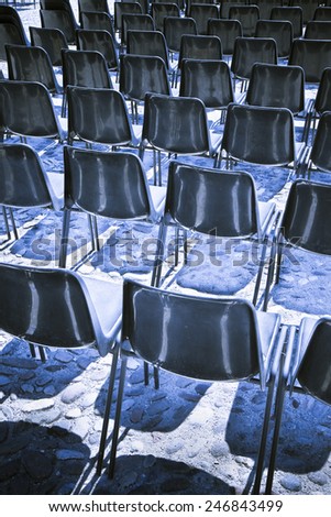 Chairs of an outdoor cinema - toned image