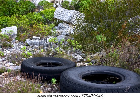Large tires abandoned in an illegal dump
