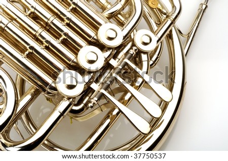 French horn detail on white background