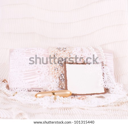 The beautiful bridal handbag, lace and wedding rings with banner add