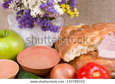 Flowers, apple, vegetables, oil and meat pork