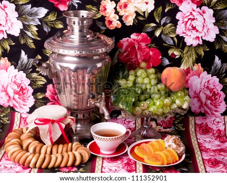 traditional old Russian tea kettle with bagels and marmalades