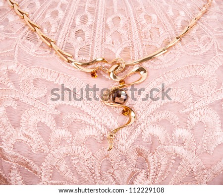 Golden jewelry and vintage laces