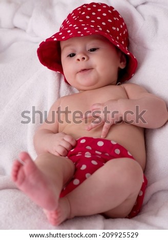Cute little girl in red hat