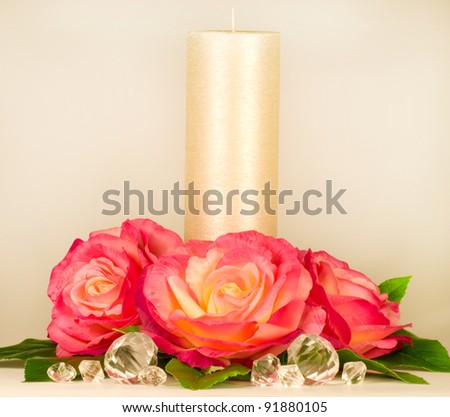Romantic still-life with white candle and rose