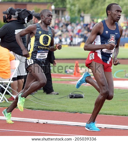 Eugene, Oregon June 12, 2014 - Arizona\'s Lawi Lalang (R) and Oregon\'s Edward Cheserek (L) set the pace in the early laps of the men\'s 5000m at the 2014 NCAA Track & Field Championships