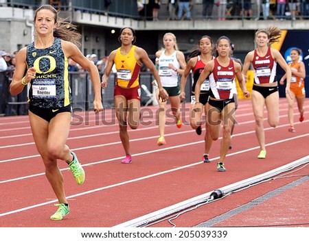 Eugene, Oregon June 12, 2014 - Laura Roesler of the University of Oregon runs away from the pack to win the women\'s 80m race at the 2014 NCAA Track & Field Championships at Hayward Field in Eugene, Or