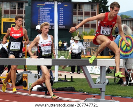 July 27, 2014 Eugene, Oregon - USA\'s Bailey Roth leads Canada\'s Ben Preisner and Germany\'s Patrick Karl over the barrier in the men\'s 3000m steeplechase during the 2014 IAAF Junior World Championships