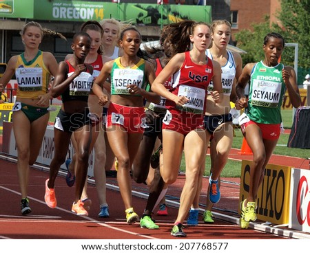 July 27, 2014 Eugene, Oregon - Dawit Seyaum (R) and Gudaf Tsegay (#7) of Ethiopia and USA\'s Alexa Efraimson (C) take an early lead in the women\'s 1500m race at the 2014 IAAF World Junior Championships