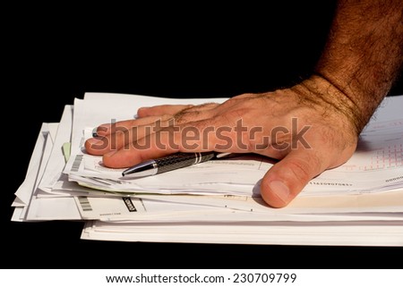 stack of paperwork and bills to pay