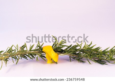 sprigs of rosemary with citrus peel