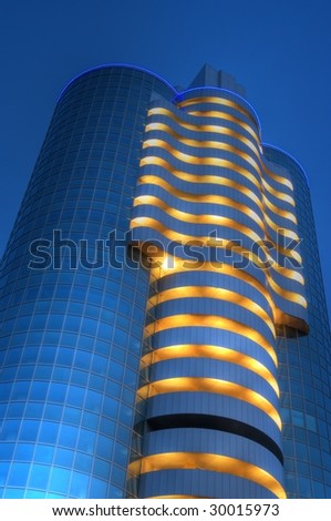 Modern building in the night with lights.