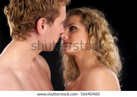 stock photo Closeup portrait of young naked couple in love over white 