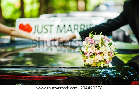 Wedding bouquet , beautiful , just married, car