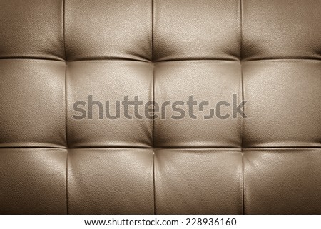Genuine leather upholstery background for a luxury decoration in Brown tones