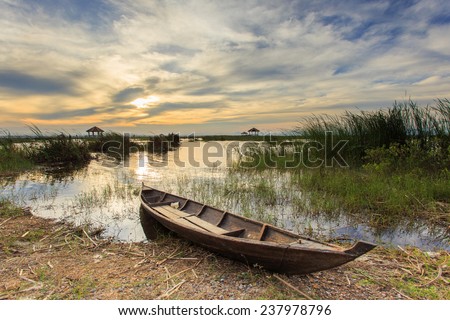 Fishing boat in lotus lake at khao sam roi yot national park, thailand