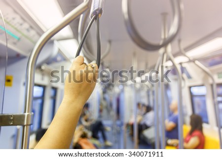 Hand handle loop in the sky train