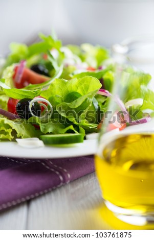 Leaf vegetable salad with black olives