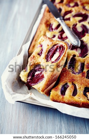 Homemade low-fat plum cake in a cake tin