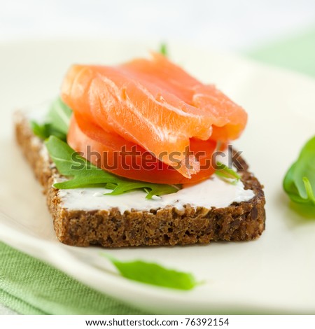 Delicious sandwich with smoked salmon
