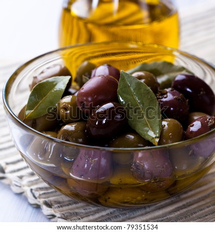 Marinated olives in a glass bowl