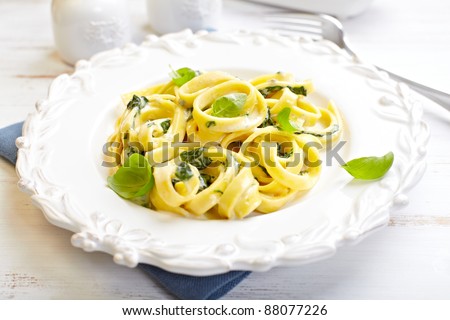 Tagliatelle pasta with blue cheese sauce and spinach