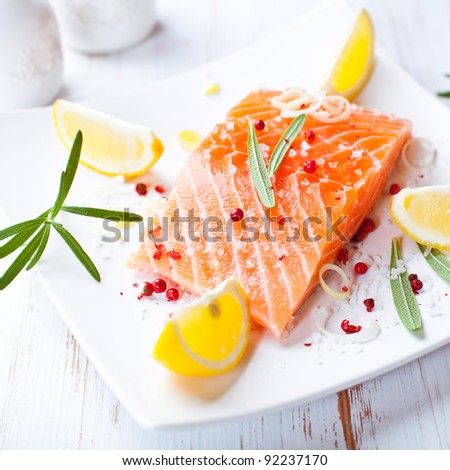 Fresh salmon fillet with sea salt and pink peppercorns