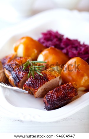 Duck breast with potato dumplings and red cabbage