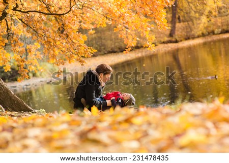 happy family enjoying autumn nature, love concept