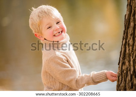 Portrait of a boy with no teeth