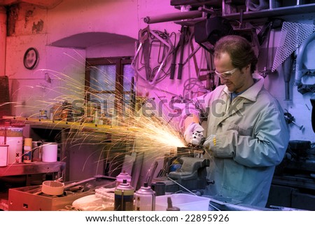 Man at work with cutting sheet metal