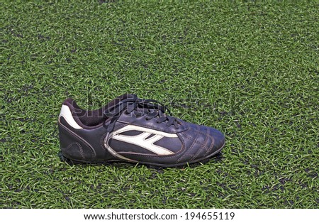 football shoes on the grass
