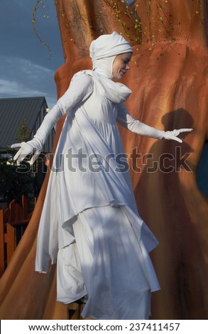 PRAGUE - DECEMBER 13, 2014 : Woman in robe St. Lucia during celebrations the feast of Saint Lucia in children's open air entertainment complex