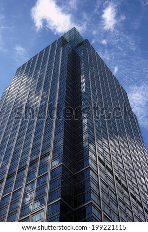 Architecture - Skyscraper with blue sky and clouds