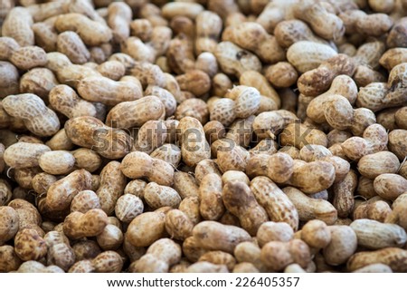 Raw peanuts at a Chinese food stall at the Clement Street Farmer\'s Market in San Francisco.