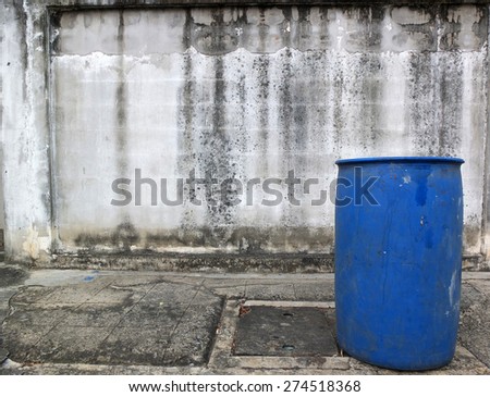 Aged empty wall background texture with Pipe cap and bin