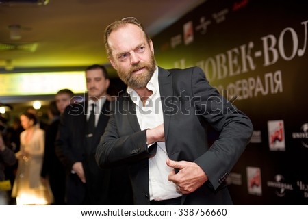 MOSCOW, RUSSIA - FEBRUARY 2, 2010: Hugo Weaving on the red carpet answering the questions, Wolfman film premiere in Moscow.