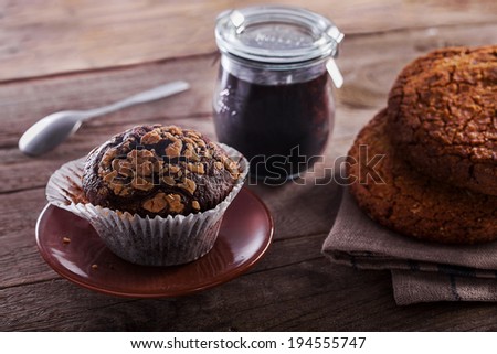 Oatmeal cookies, jam and cake with nuts
