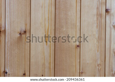 Background, wooden vertical light boards. Wall villas