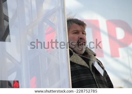 Moscow, Russia - March 10, 2012. Journalist Alexander Ryklin on an opposition rally on election results