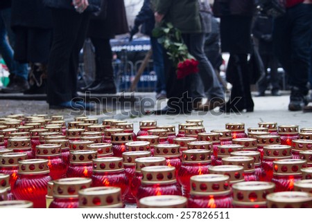 Moscow, Russia - March 3, 2015. Mourning candles on the street near the funeral of Boris Nemtsov. Farewell to the oppositionist Boris Nemtsov, who was killed near the Kremlin