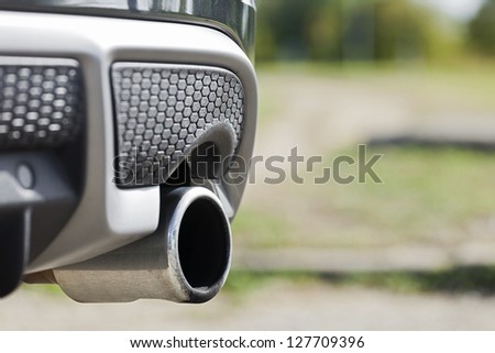 Close up shot of car exhaust pipe