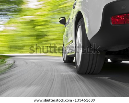 Driving in the curve - stock photo