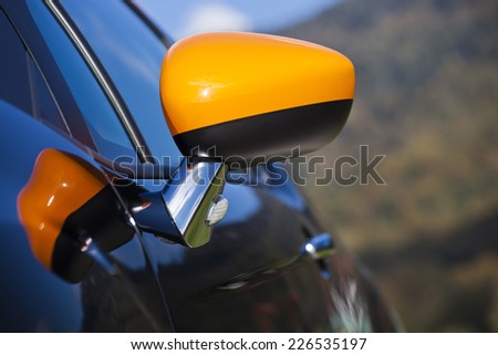 Modern sports car rear view mirror