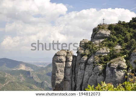 View on the mountain of Montserrat and the cross of St Michael Catalonia Spain View on the mountain of Montserrat and the cross of St Michael Catalonia Spain