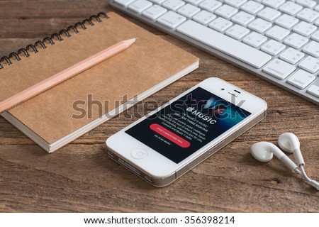 CHIANGMAI,THAILAND - December 30, 2015: Selective focus  screen shot of music app showing on iPhone 4s in his office. Apple Music is the new iTunes-based music streaming service that arrived on iPhone