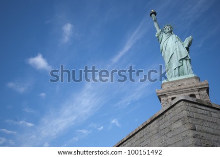 Statue of Liberty in New York City on a blue sky background