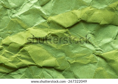 Green crepe paper background abstract.